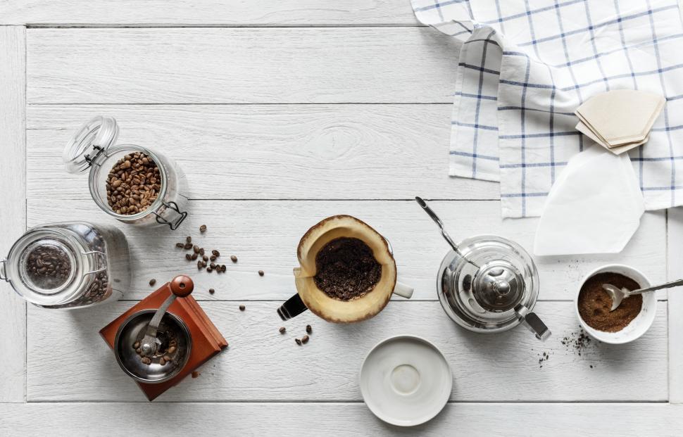 Free Image of Overhead of water kettle and coffee filter cone 