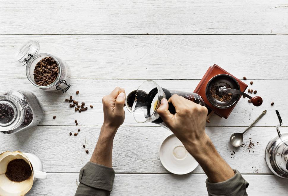 https://freerangestock.com/sample/120961/close-up-of-coffee-being-poured-into-a-mug--white-background.jpg