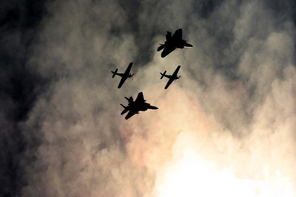 Free Stock Photo of Airshow planes silhouetted against dramatic sky ...