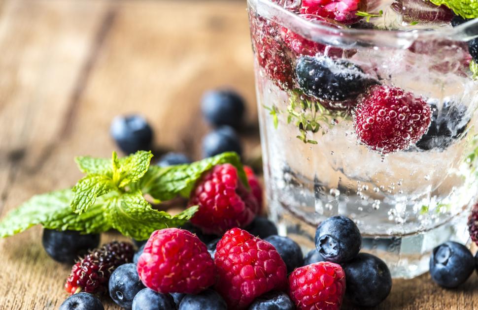 Free Image of Close up of chilled beverage with blueberry and raspberry 