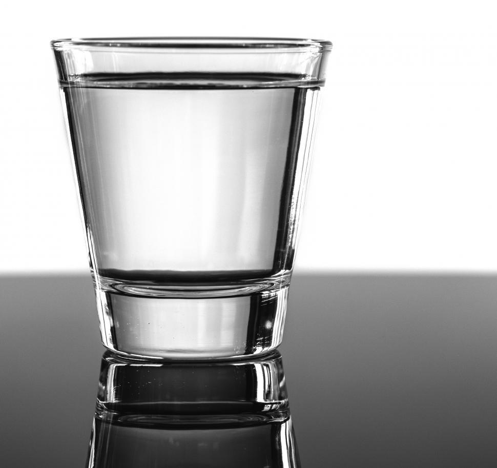 Clear Glass Of Water On A White Background Stock Photo - Download