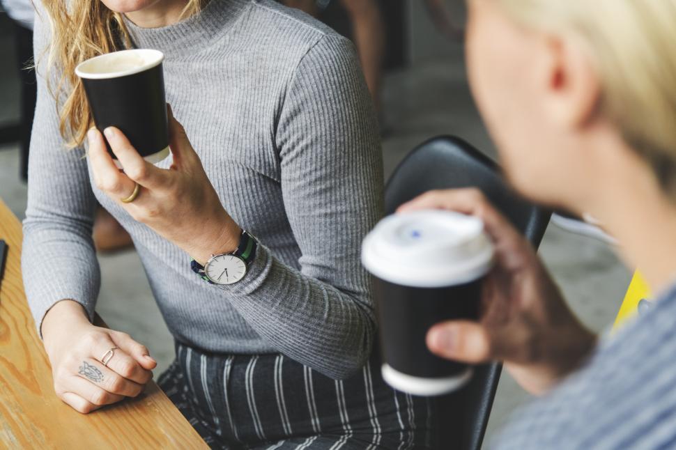 Free Image of Women with disposable coffee cups 