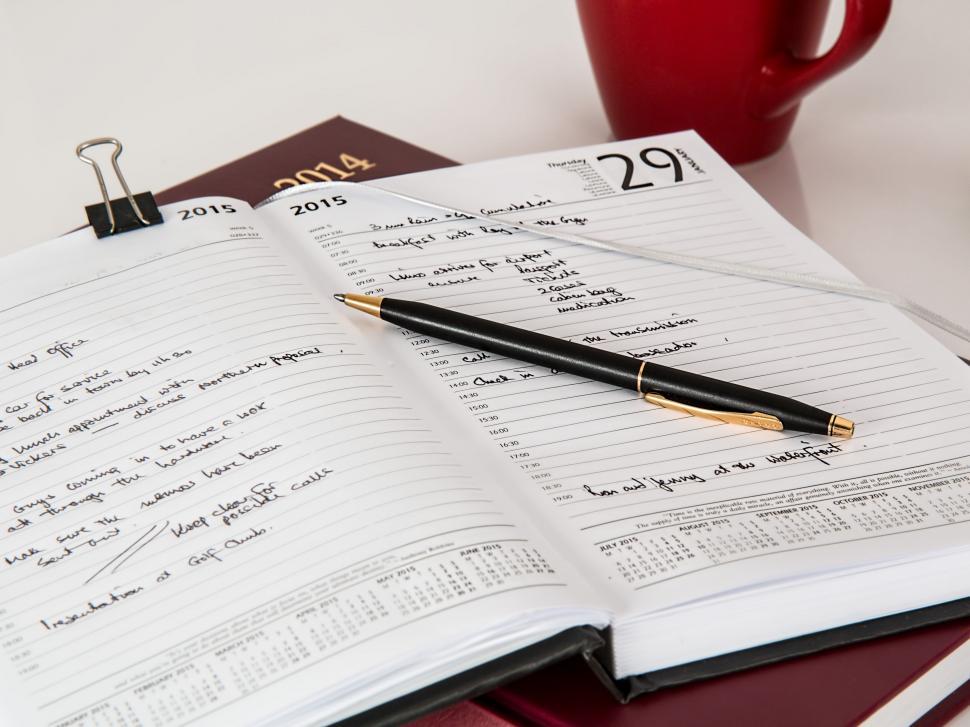 Free Image of Notebook and Pen 