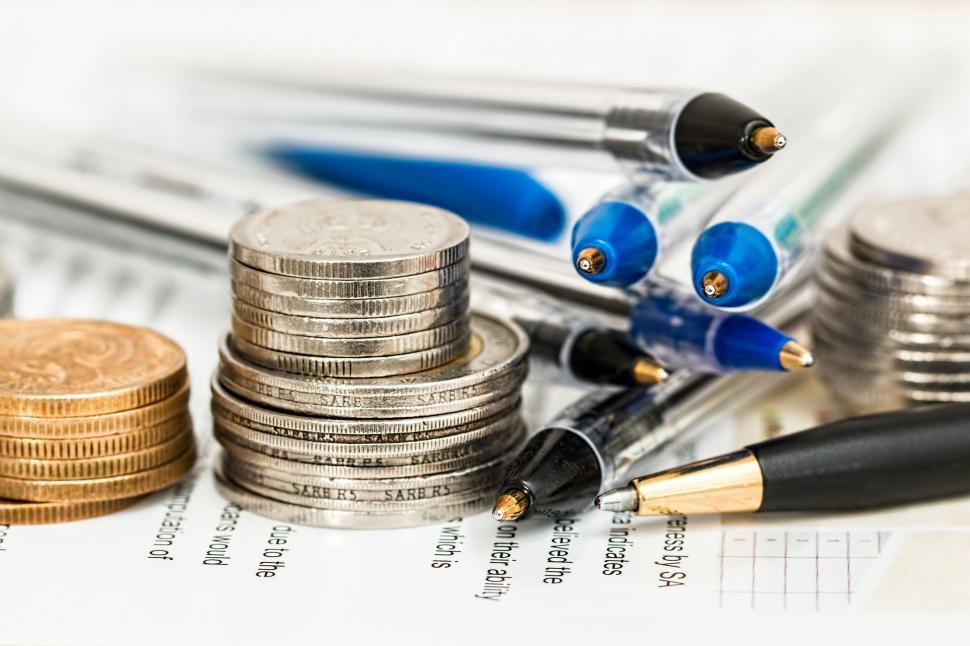 Free Image of Stack of Coins on Top of Another Stack of Coins 