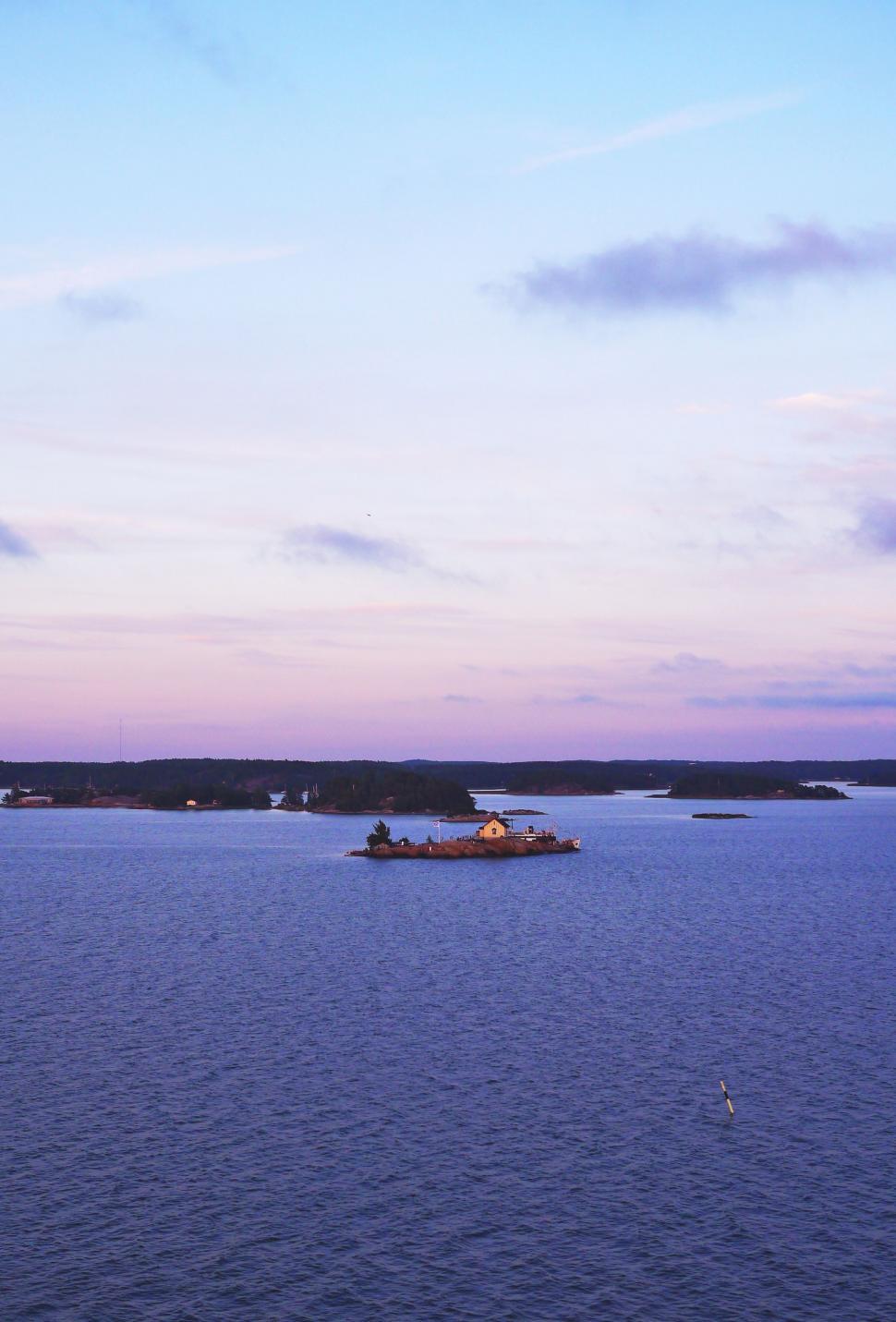 Free Image of Island and Lake with blue sky - Sunset  