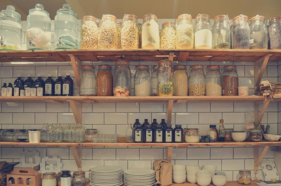 Free Image of Mason Crystal Jars on wooden rack  
