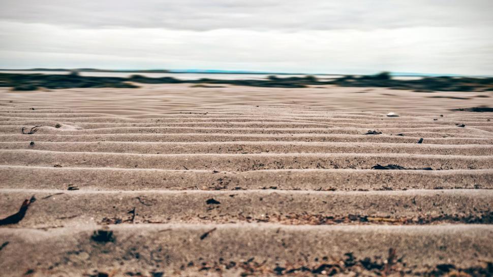 Free Image of Wave Sand Pattern at beach  