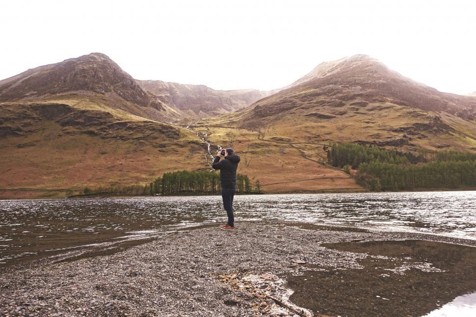 Free Image of Photographer on Mountains  