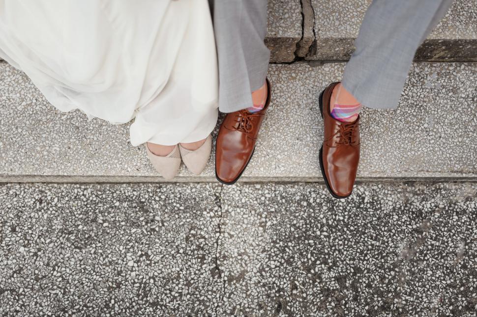 Free Image of Man and Woman Feet with Shoes  