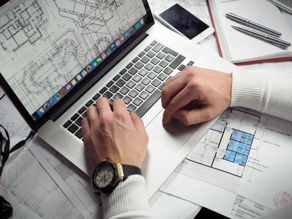 Free Image of Hands on Laptop 
