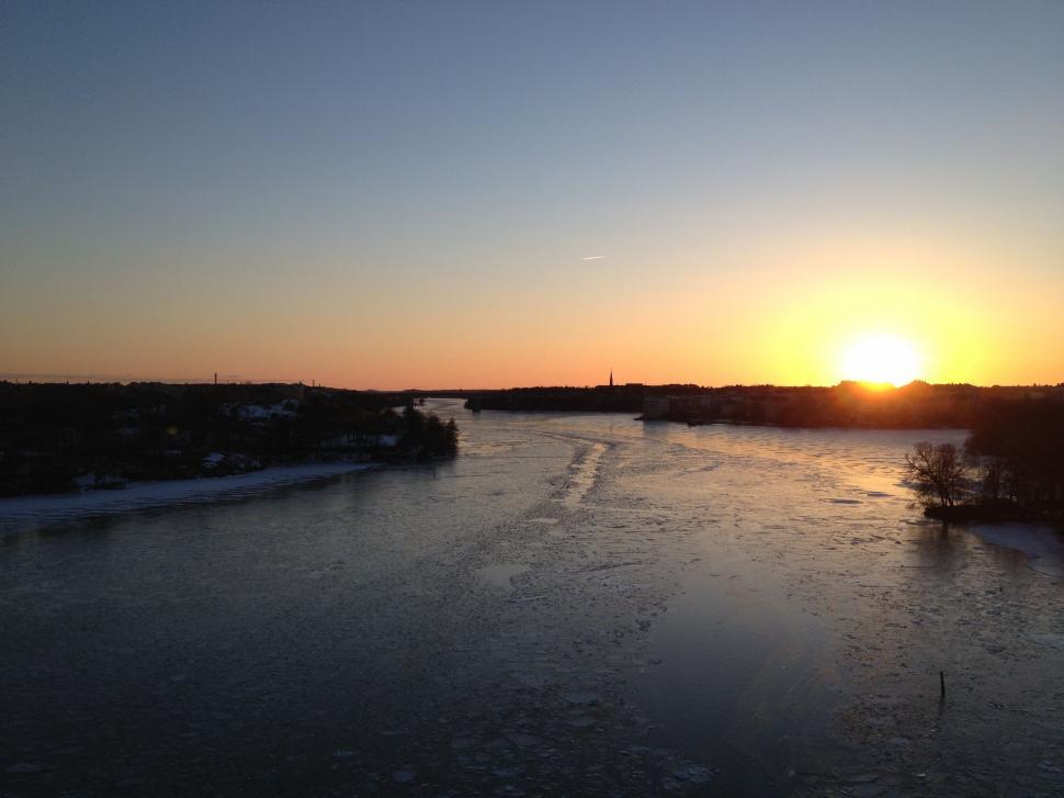 Free Image of Frozen Lake and Sun 