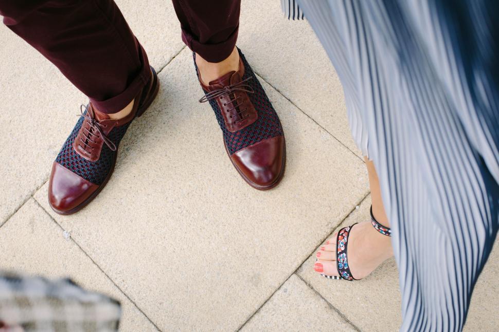 Free Image of Red Shoes and High Heels in Feet  