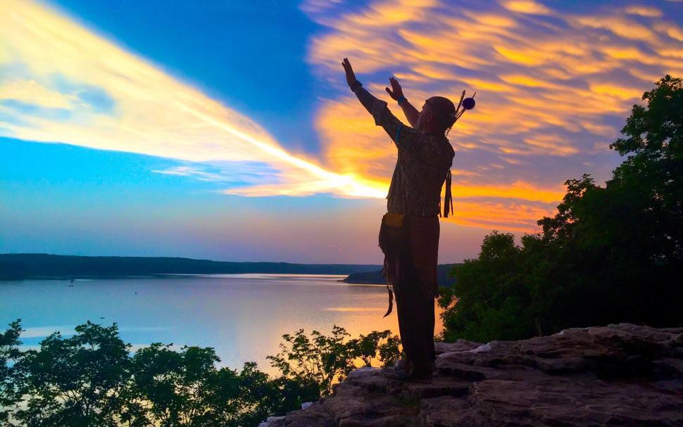 Free Image of Hiker with hands up  