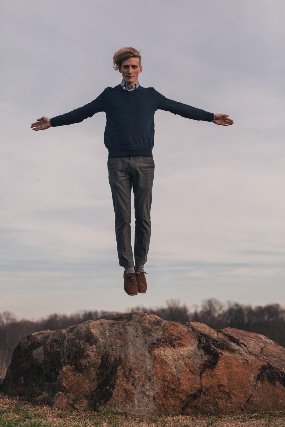 Free Stock Photo of Young Man Flying in the air