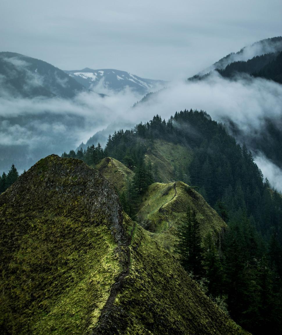Free Image of Mountain Range in Clouds  