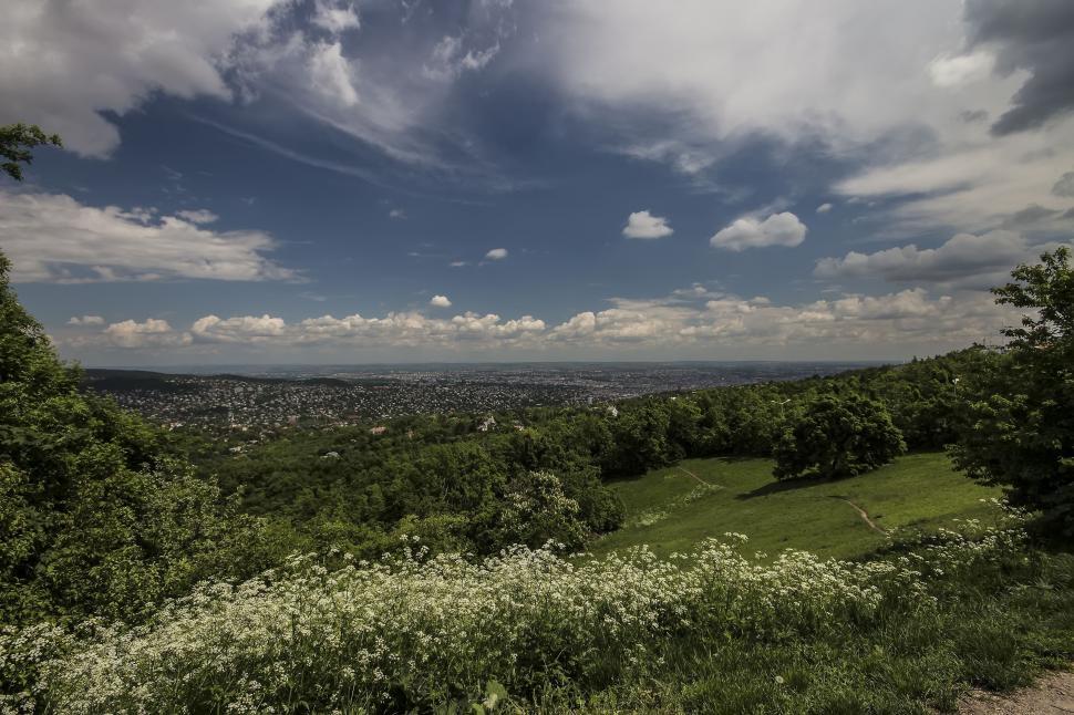 Free Image of Green Mountains with City 