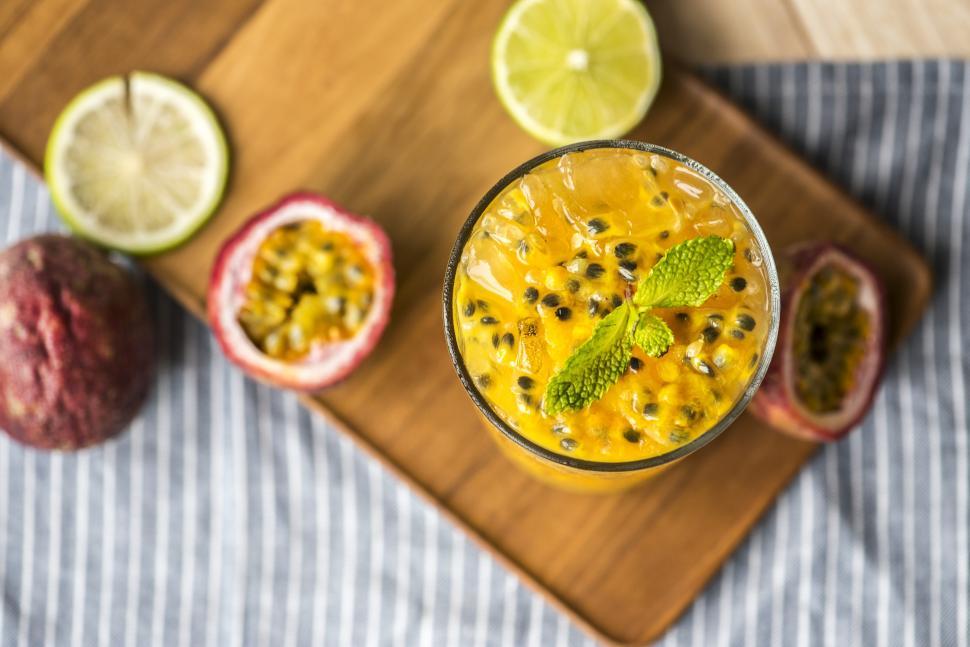 Free Image of Overhead view of a glass of passion fruit smoothie 