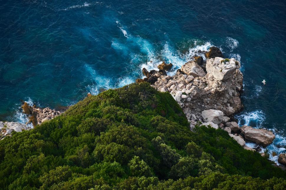 Free Image of Green Mountain and Ocean  