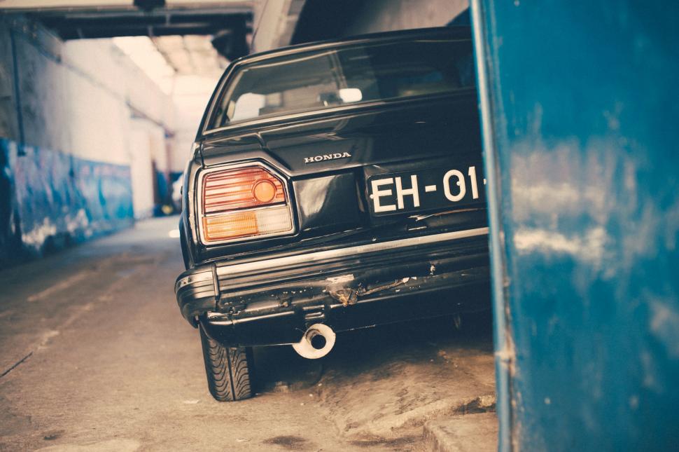 Free Image of Honda Car parked at street  