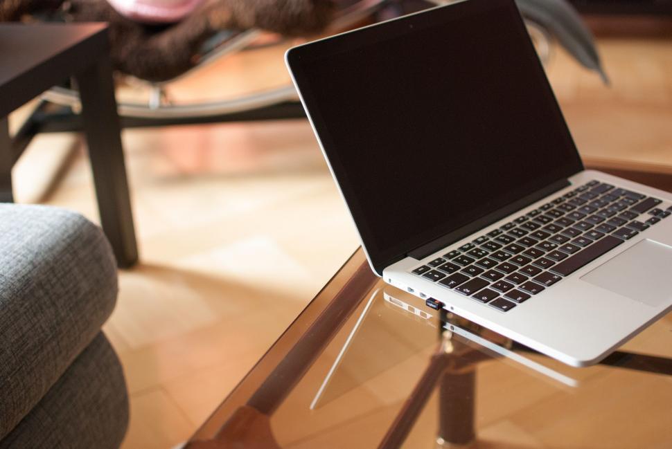 Free Image of Laptop on Glass Table  