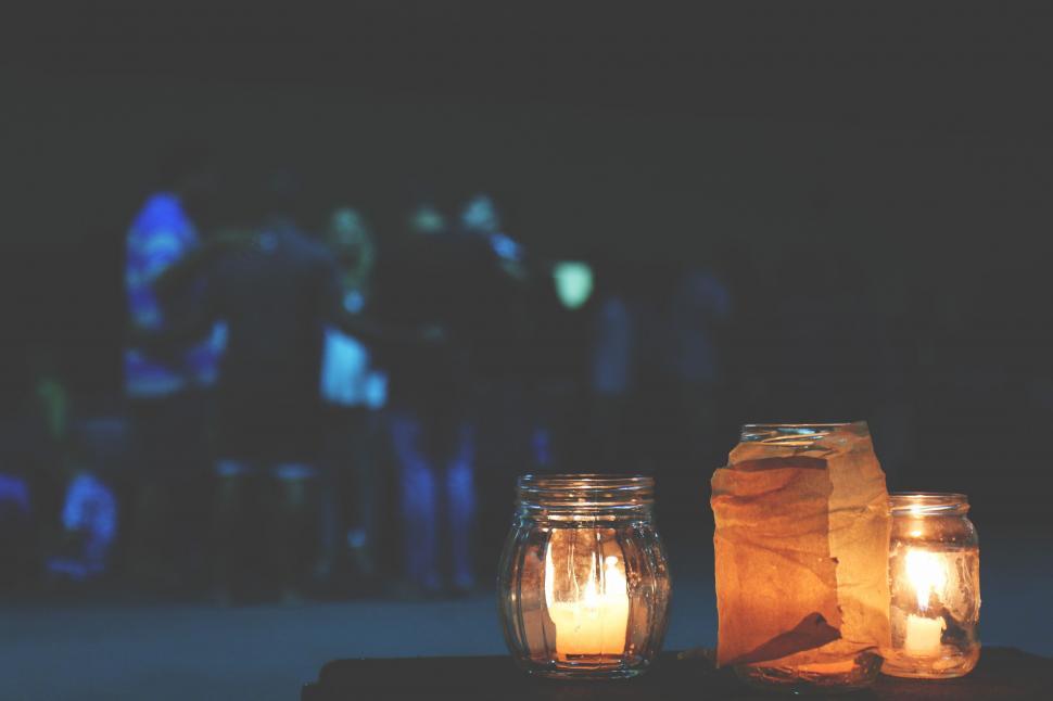 Free Image of Candle Lights in containers  