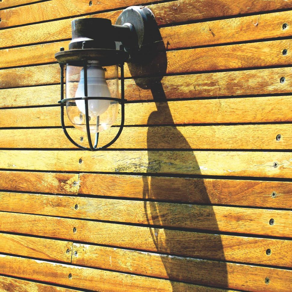 Free Image of Lamp on wooden wall  