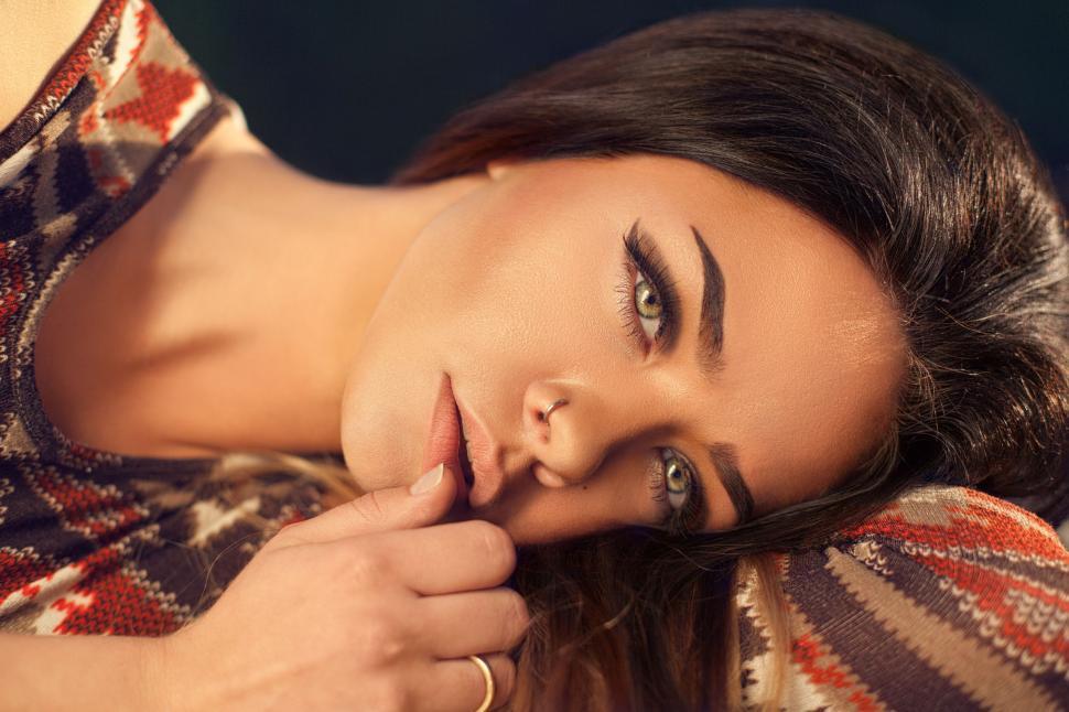 Free Image of Woman Lying - Eye contact  