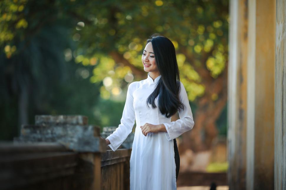 Download A Girl With Long Black Hair Looking Up