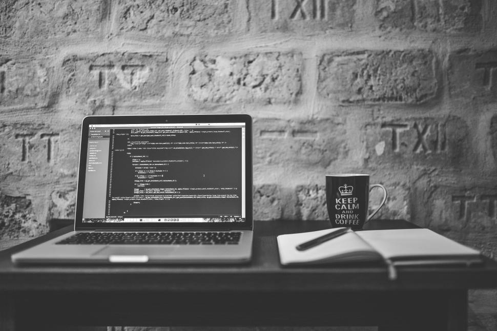 Free Image of Laptop and Coffee Mug on table  