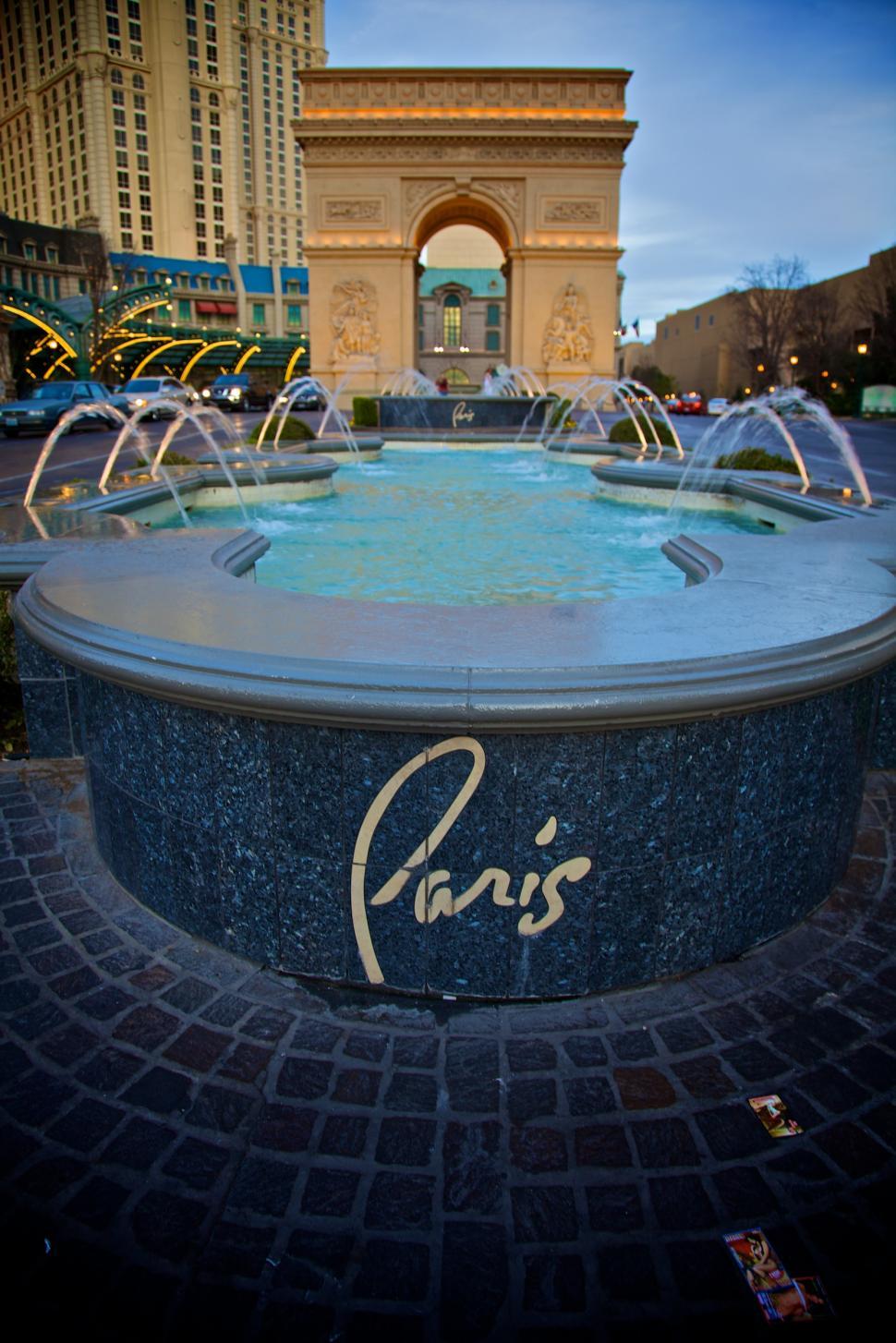 Free Image of Fountain in Front of Tall Building 