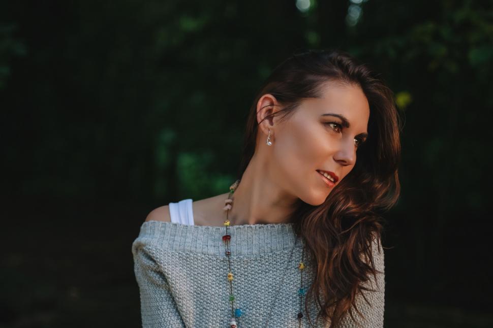 Free Image of Side View of young woman with open hair  