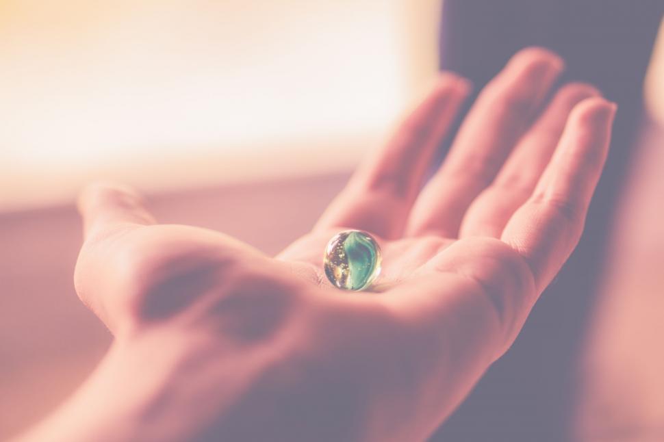 Free Image of Marble in Hand  