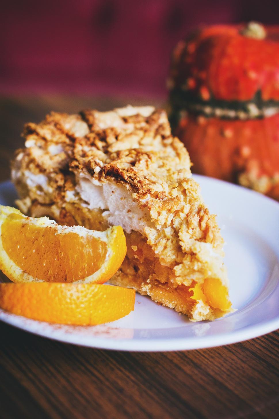 Free Image of Lemon cake on wooden table  