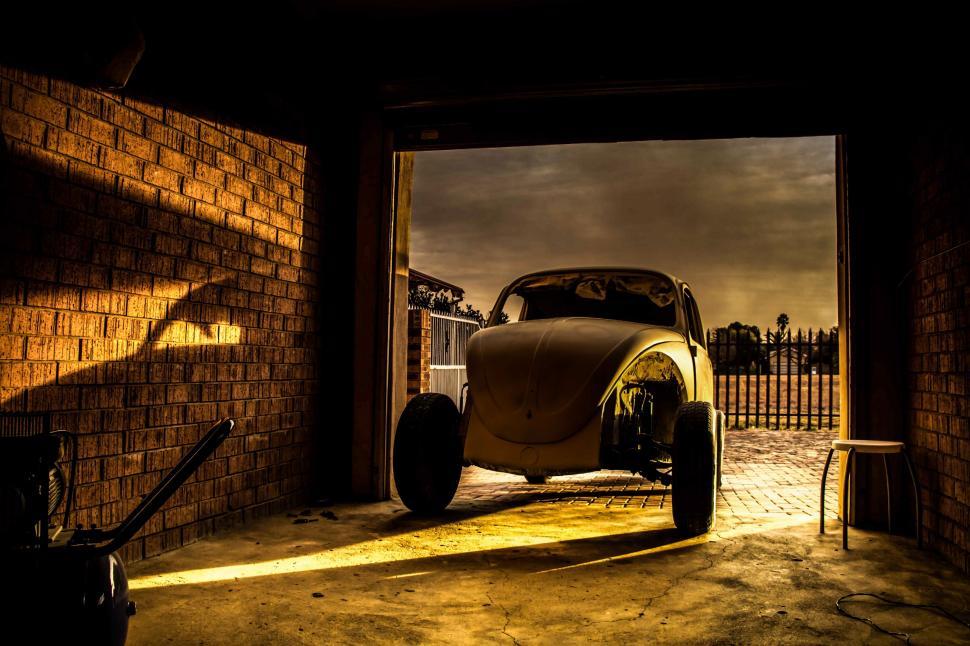 Free Image of Broken Car with Black Cloudy Sky  