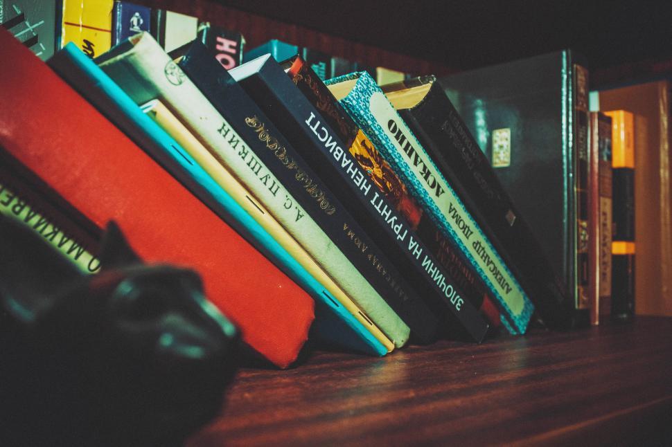 Free Image of Books on wooden shelf  