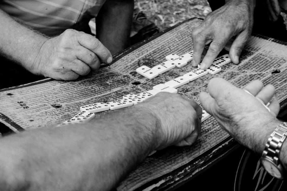Free Image of Hands and dominoes 