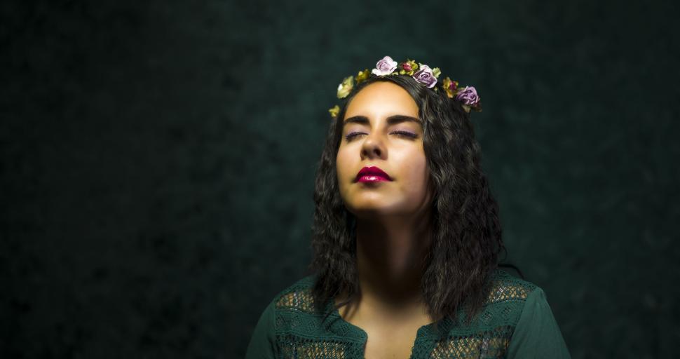 Free Image of Female Fashion Model with flower wreath on her head 