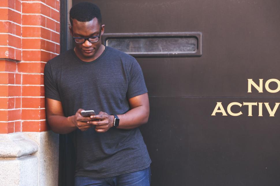 Free Image of African Man With Mobile Phone  