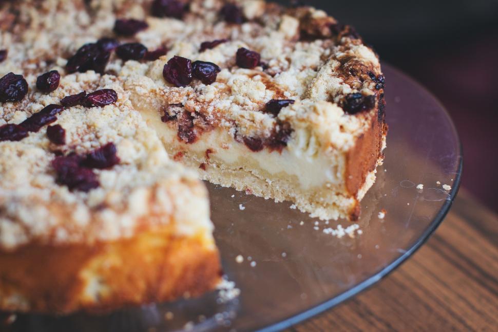 Free Image of Blueberry cheesecake on wooden table  