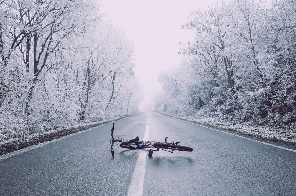 Free Image of Mountain bike on Hazy Snow Road 