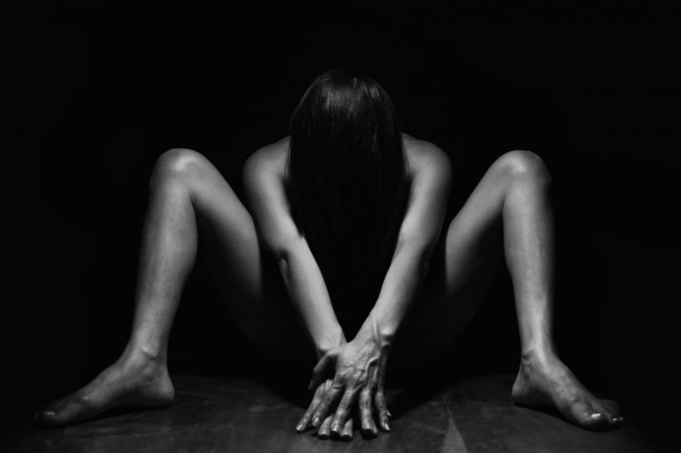 Black white naked woman picture Free Stock Photo Of Dark View Of Naked Woman With Hands In Front On Black Background Download Free Images And Free Illustrations
