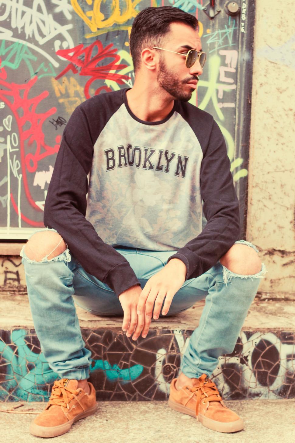 Free Image of Urban Man and Graffiti Wall 