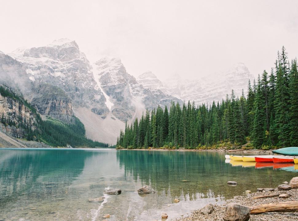 Free Image of Snow Mountains and Lake With Boats 