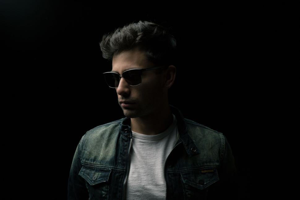 Boy Wearing Sunglasses Behind A Dark Background, Cool Profile