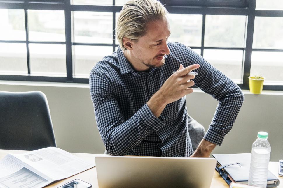 Free Image of A bearded Caucasian man in a discussion 