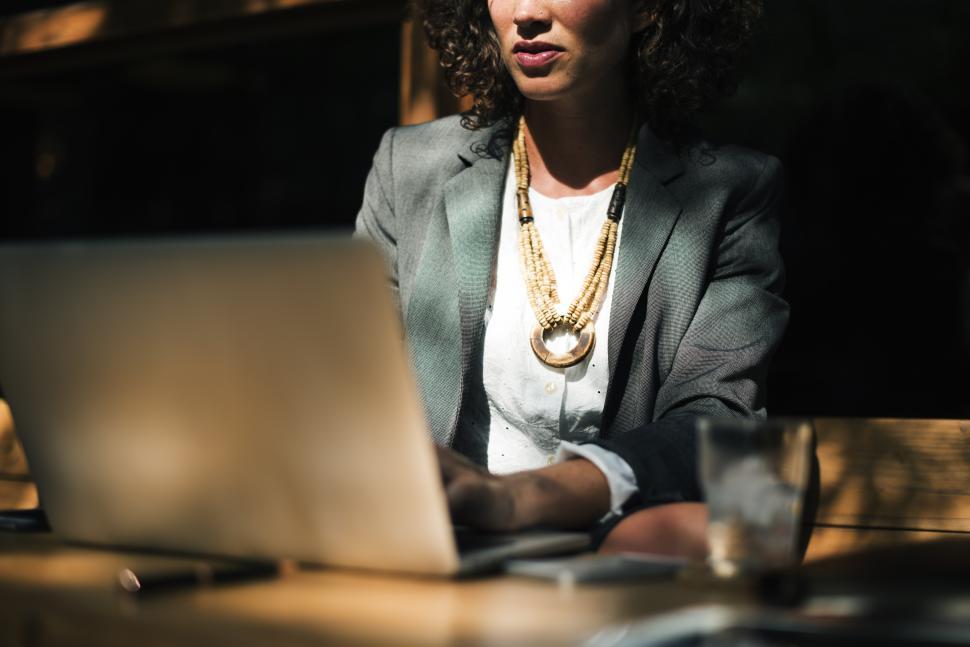 Free Image of A young anonymous woman looking at her mobile phone 