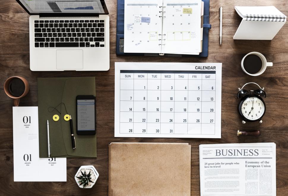 Free Stock Photo of Flat lay of a laptop and a coffee mug along 