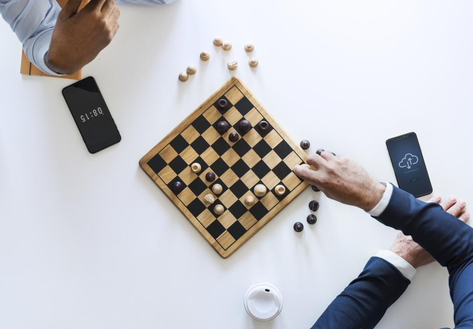 Overhead view of a chess board set up for a game Stock