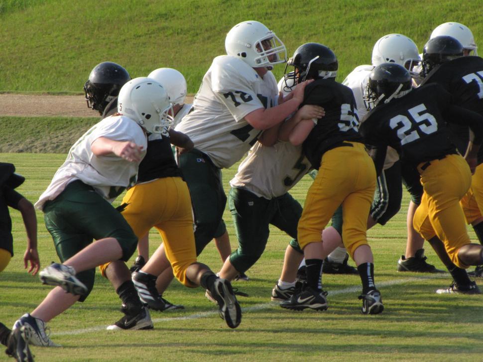 American Football Players On The Field Stock Photo - Download