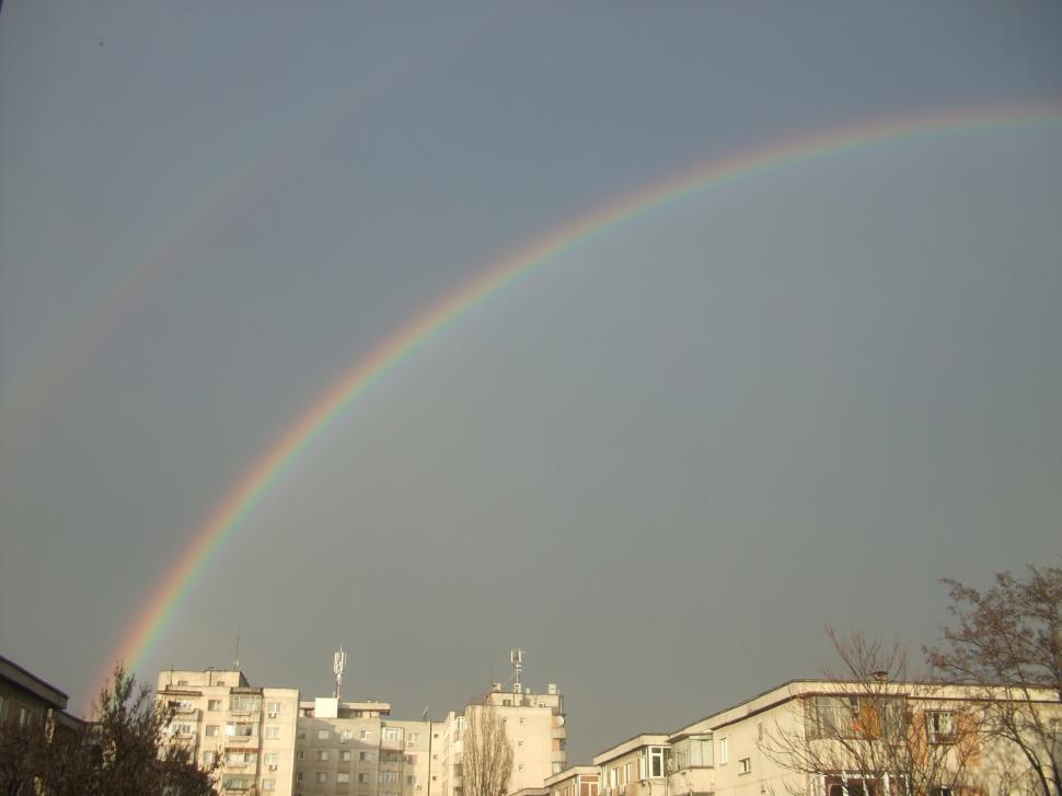 Free Image of Rainbow over small town 